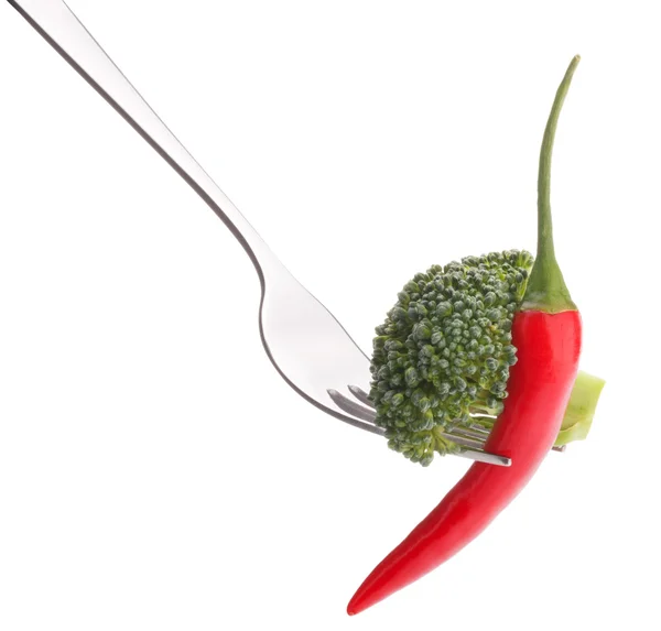 Fresh raw vegetables on fork — Stock Photo, Image