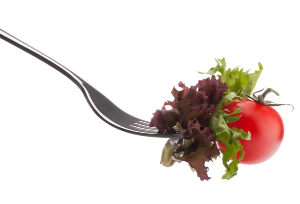 Salada fresca e tomate cereja em garfo — Fotografia de Stock