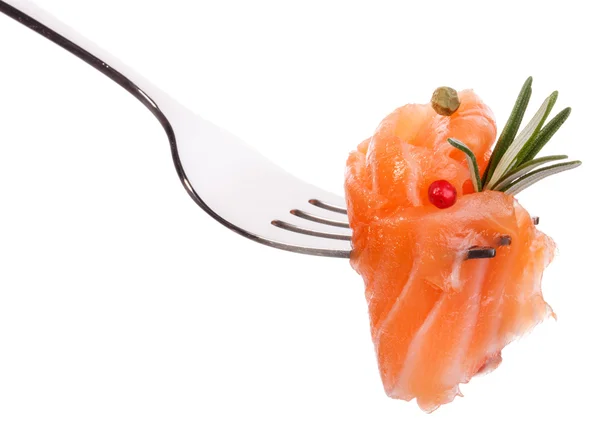 Salmon piece with rosemary on fork — Stock Photo, Image