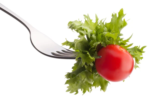 Salada fresca e tomate cereja em garfo — Fotografia de Stock