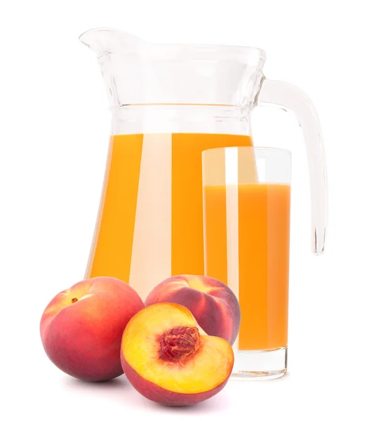 Peach juice in glass jug — Stock Photo, Image