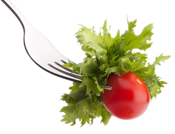 Fräsch sallad och körsbär tomat på gaffeln — Stockfoto