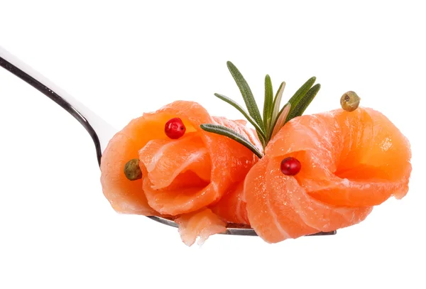 Salmon pieces on fork — Stock Photo, Image