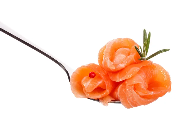 Salmon pieces on fork — Stock Photo, Image