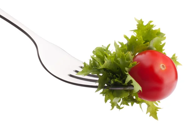 Fresh salad and cherry tomato on fork — Stock Photo, Image