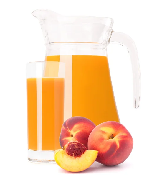 Peach juice in glass jug — Stock Photo, Image