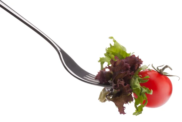 Salada fresca e tomate cereja em garfo — Fotografia de Stock