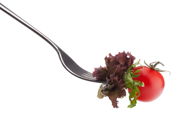 Fresh salad and cherry tomato on fork — Stock Photo, Image