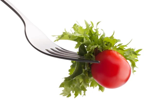 Fresh salad and cherry tomato on fork — Stock Photo, Image