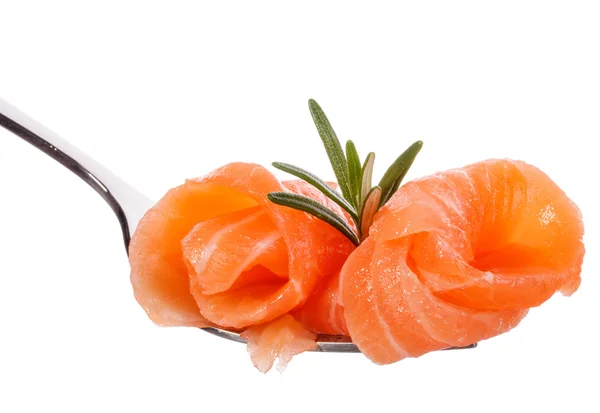 Salmon pieces with rosemary on fork — Stock Photo, Image