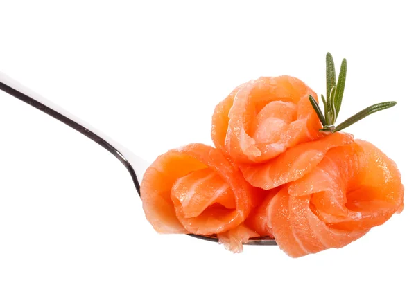 Salmon pieces with rosemary on fork — Stock Photo, Image