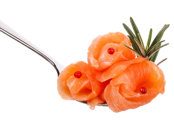 Salmon pieces on fork — Stock Photo, Image