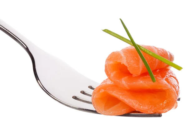 Salmon piece on fork — Stock Photo, Image