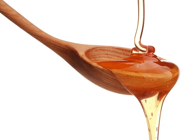 Honey dripping on white — Stock Photo, Image