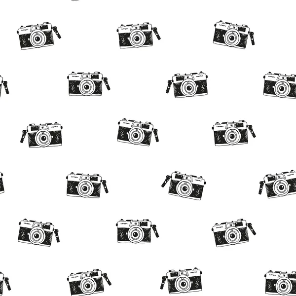 Hand drawn seamless pattern with doodle hipster's camera — Stock Vector