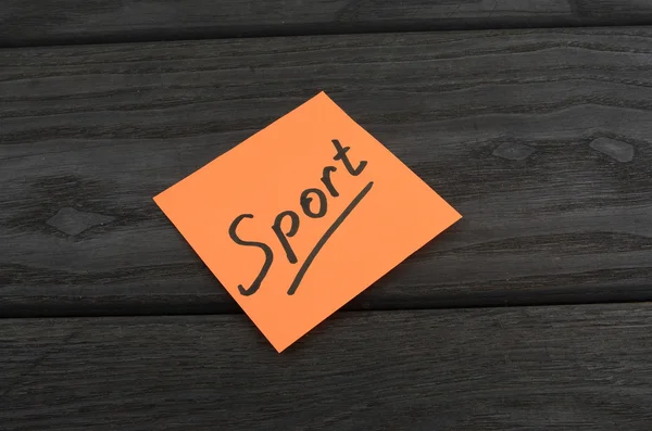 Orangefarbene Aufkleber mit der Aufschrift Sport — Stockfoto