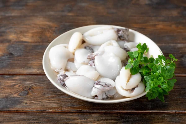 Raw Cuttlefish Ceramic Plate Kitchen Table Lots Peeled Squid Bowl — Stock Photo, Image