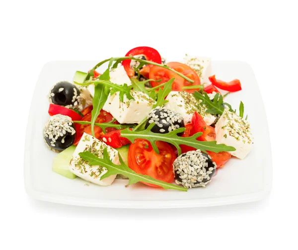 Insalata fresca con formaggio feta con erbe isolate su bianco Immagini Stock Royalty Free