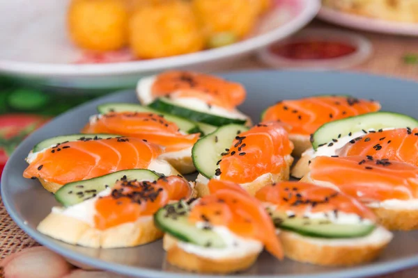 Mini Canapes Salted Salmon Cucumber Bread Decor Sesame Seeds Light — Stock Photo, Image