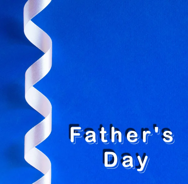 Blue Paper Background Minimalistic Decor Ribbons Congratulations Father Day Contrast — Stock Photo, Image
