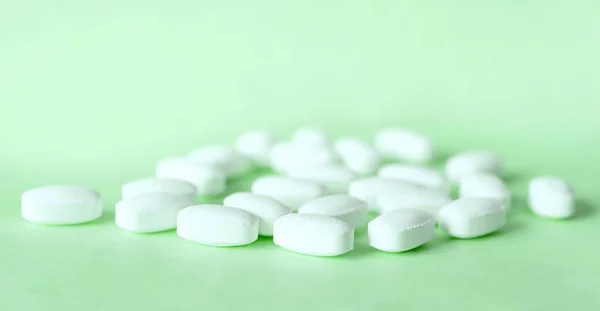 White Pills Light Green Background Healthcare Medicine — Stock Photo, Image