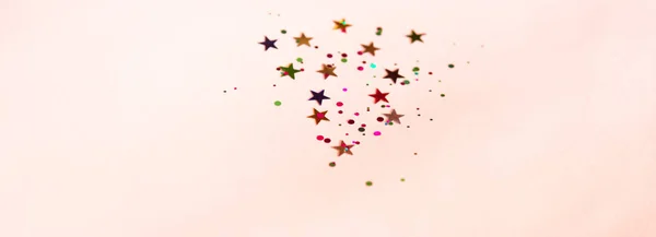 Ροζ Φόντο Πολύχρωμα Glitter Και Αστέρια Μέρος Φόντο Κομφετί — Φωτογραφία Αρχείου