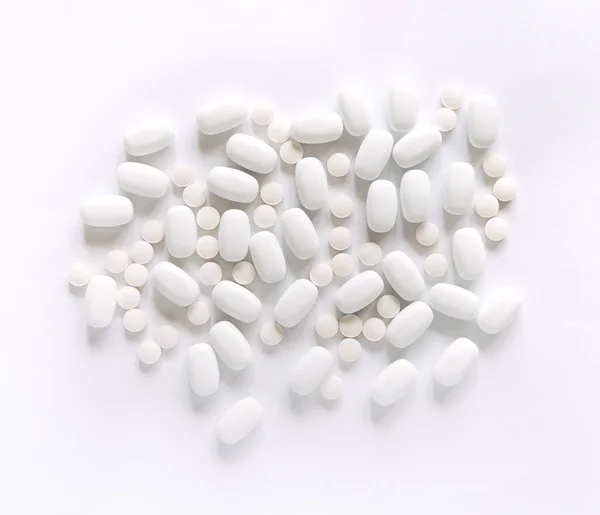 Pílulas Brancas Num Fundo Branco Saúde Medicina — Fotografia de Stock
