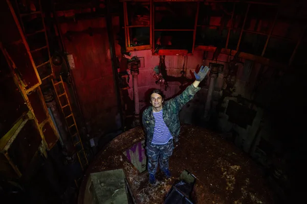 Urban explorer in abandoned missile underground command post — Stock Photo, Image