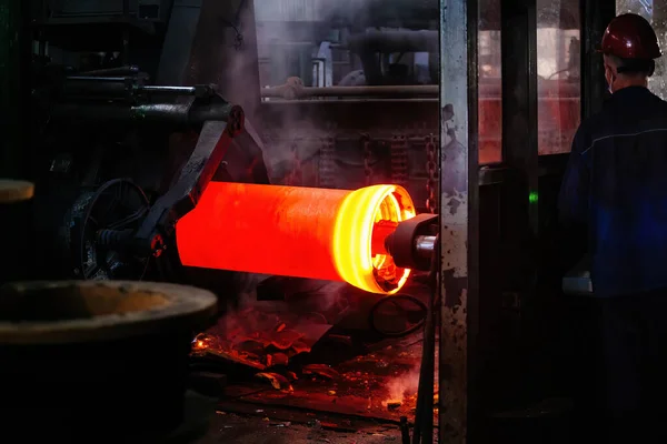 Iron pipe centrifugal pipe casting machine at the foundry.