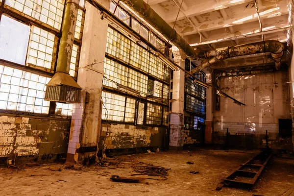 Dark creepy empty abandoned industrial building interior at night — Stock Photo, Image