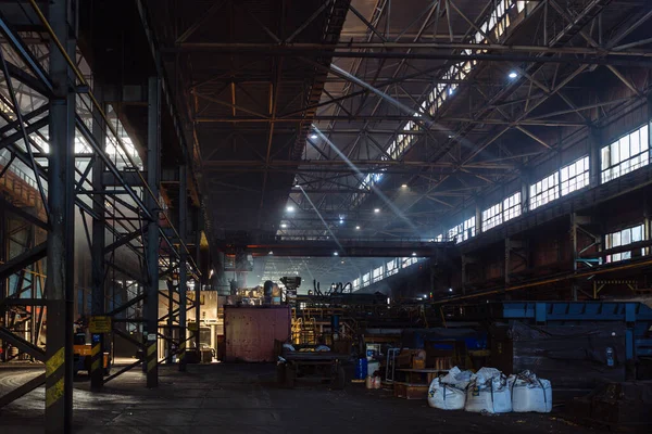 Iron casting at the foundry at metallurgical factory.