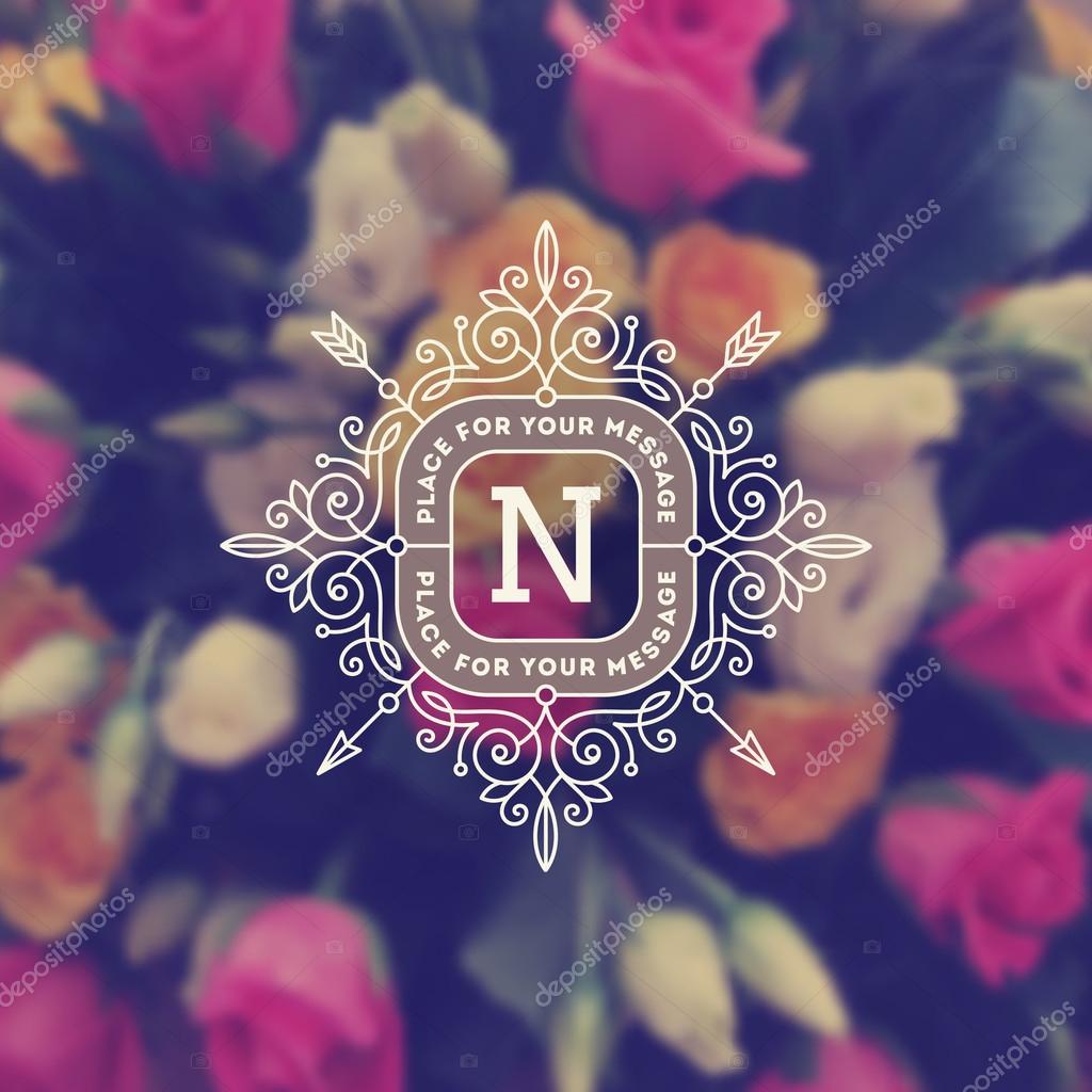 Vintage monogram logo template with flourishes calligraphic elegant ornament elements on a blurred flowers background. Identity design with letter for cafe, shop, store, restaurant, boutique, hotel, heraldic, fashion and etc.