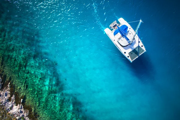 Amazing view to Yacht sailing in open sea at windy day. Drone view - birds eye angle — Stock Photo, Image