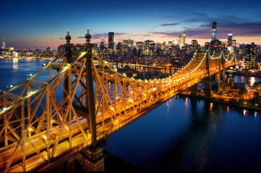 New York City - amazing sunset over manhattan with Queensboro bridge clipart