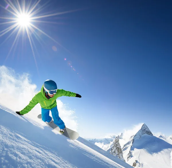 Snowboarder en haute montagne — Photo