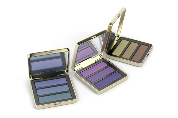 Eye shadows in gold boxes — Stock Photo, Image