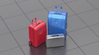 Havaalanında kırmızı ve mavi bavullar ve gümüş çanta.