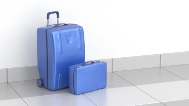 Döşeme üzerinde mavi plastik bavul ve çanta.