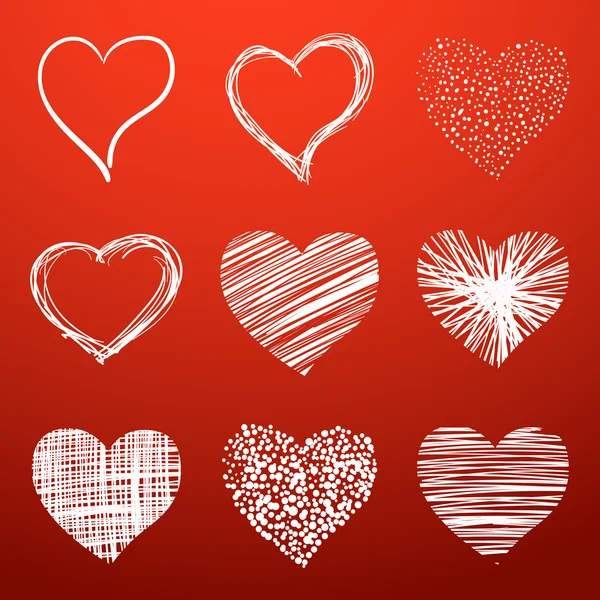 Set of scribbled hearts — Stock Vector