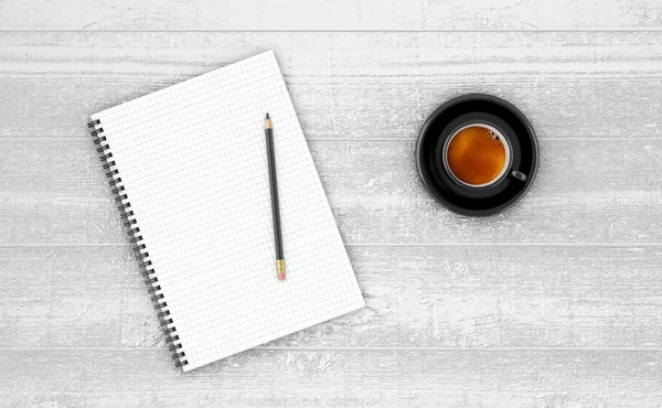 Notepad with cup of coffee on wooden table. — Stock Photo, Image