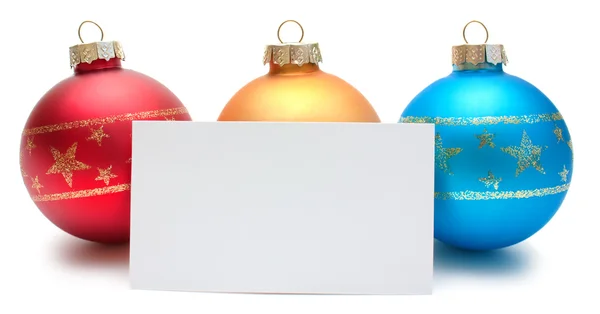 Tres bolas de Navidad con tarjeta — Foto de Stock