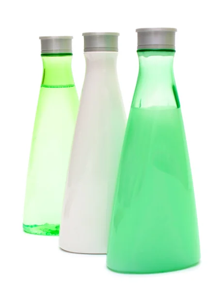 Trois flacons cosmétiques (vert et blanc ) — Photo