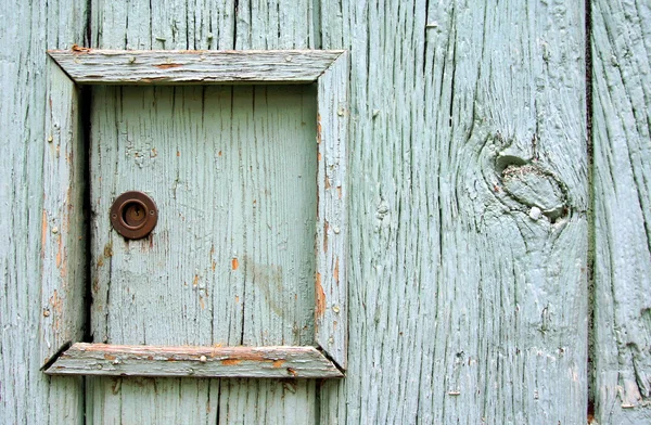 Oude gebarsten hout met deur — Stockfoto
