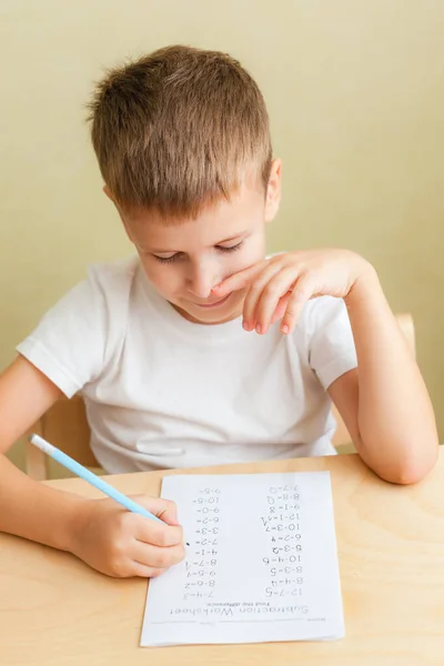Close up portrait of cute boy learning at home. — Stock Photo, Image