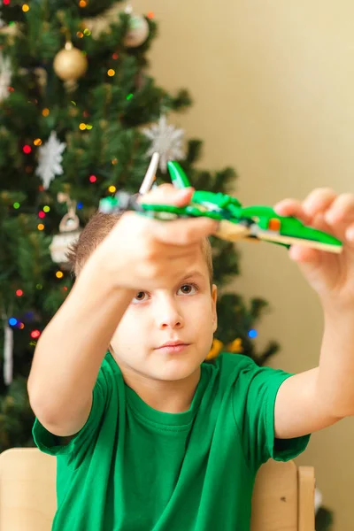 Boy play with pterodactyl made from plastic blocks — Stock Photo, Image