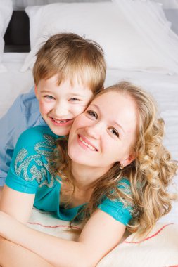 Close up of smiling mom and son