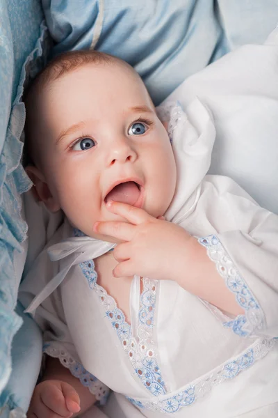 Close up of nice boy in his cradle — Stock Photo, Image