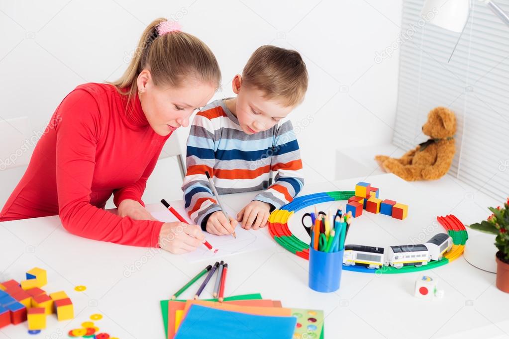 Mother and child drawing together