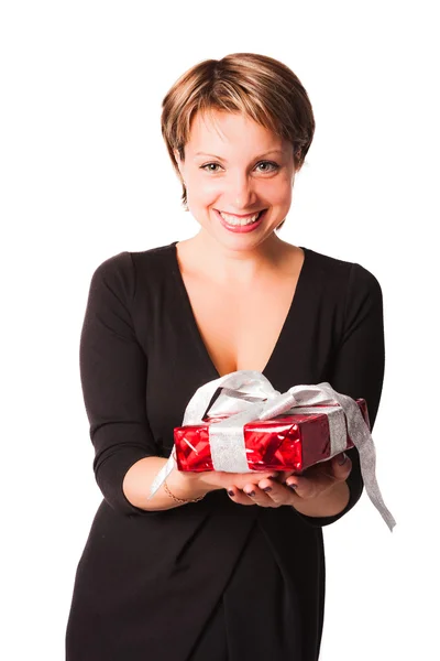 Smiling lady giving red box with gift — Stock Photo, Image