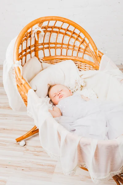 Baby girl sleeping in cradle — Stock Photo, Image